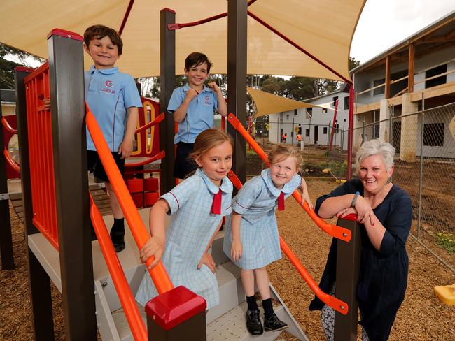 08/10/2018: Principal Susan Ryan with students Zander, Louie, Indie & Mira at Lisieux Catholic Primary School in Torquay. The Victorian state government has promised to triple its investment into the non-government schooling sector over the next four years. Stuart McEvoy/The Australian.