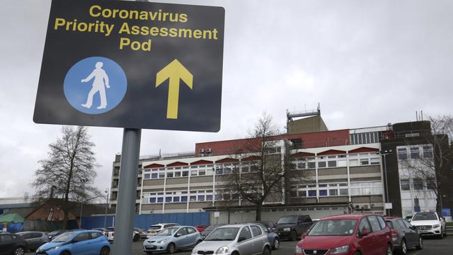 A sign outside Watford General Hospital directs patients to a newly set up coronavirus assessment area. Picture: PA