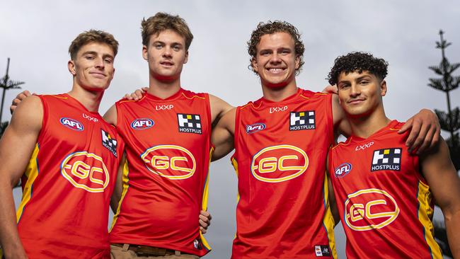 MELBOURNE, AUSTRALIA - NOVEMBER 21: (L-R) Will Graham, Ethan Read, Jed Walter and Jake Rogers of the Suns pose for a photograph following the 2023 AFL Draft at Marvel Stadium on November 21, 2023 in Melbourne, Australia. (Photo by Daniel Pockett/Getty Images)