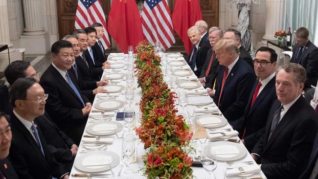 US President Donald Trump and China's President Xi Jinping, along with members of their delegations, hold a dinner meeting at the end of the G20 Leaders' Summit in Buenos Aires.