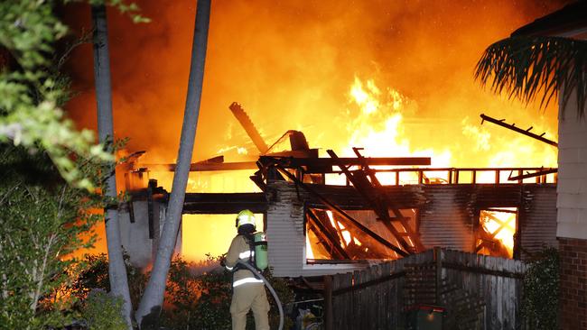 The home was completely engulfed in flames when firefighters arrived.