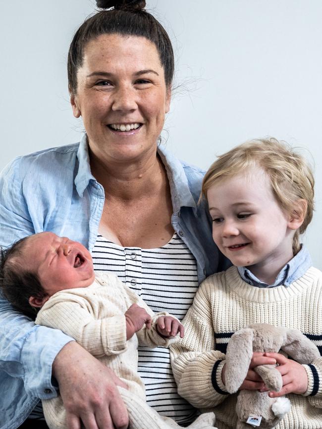 Katherine Bell with her children, newborn Max and Miles Tesoriero at Epworth Freemasons. She says she’s willing to sacrifice and save for their future. Picture: Jake Nowakowski