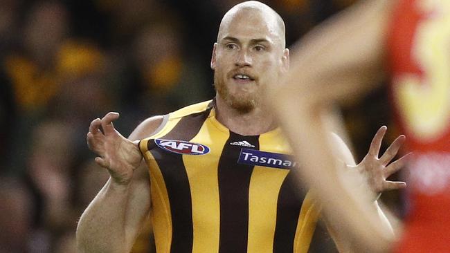 Jarryd Roughead of the Hawks celebrates the first of many on his home farewell