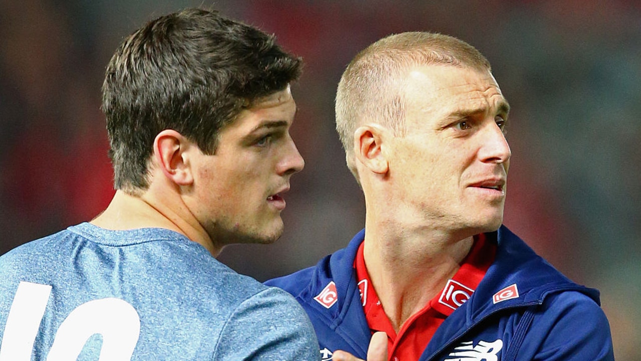 MELBOURNE, AUSTRALIA - APRIL 24: Simon Goodwin the assistant coach of the Demons speaks to Angus Brayshaw during the round five AFL match between the Melbourne Demons and the Richmond Tigers at Melbourne Cricket Ground on April 24, 2016 in Melbourne, Australia. (Photo by Quinn Rooney/Getty Images)