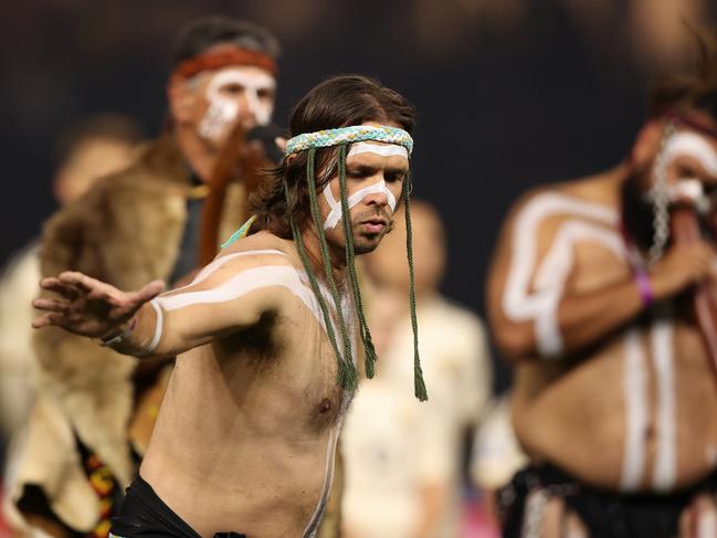 PERTH, AUSTRALIA - MAY 31: Aboriginal dancers perform during the welcome to country before the friendly between AC Milan and AS Roma at Optus Stadium on May 31, 2024 in Perth, Australia. (Photo by Paul Kane/Getty Images)