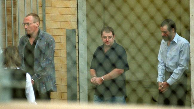 Mark Ray Haydon, right, with John Justin Bunting, centre, and Robert Joe Wagner, left, following their arrest. Picture: Michael Milnes