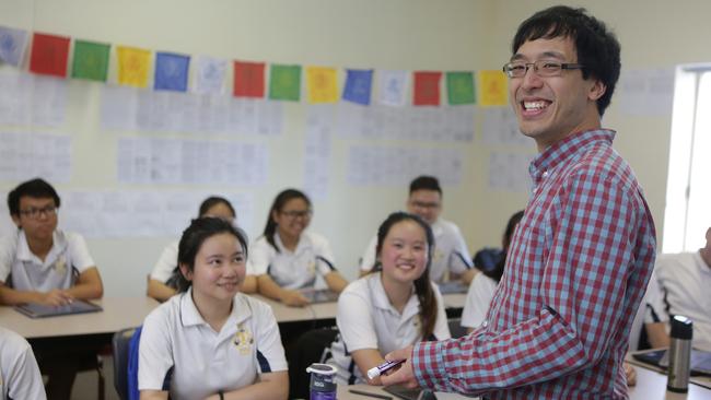 Teach4Peace coach Dr Min Zhao Lee with students at Pal Buddhist School. Picture: Tim Clapin