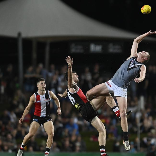 Sam Hayes and Tom Campbell compete in a ruck conteted in Cairns.