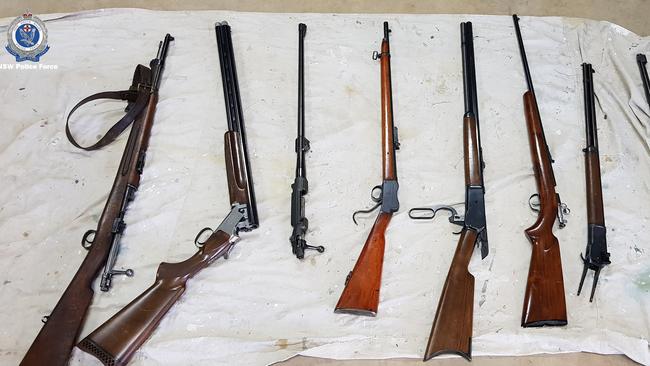 Some of the weapons, guns and ammunition seized by Strike Force Colenso investigators. Picture: NSW Police