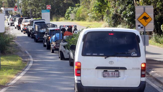 Line up of vehicles at the entrance of Molendinar Waste and Recycling Centre. Picture by Richard Gosling.