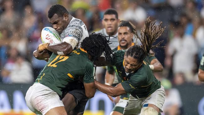 Asaeli Ratuvoka of Fiji is tackled during the gold medal playoff of the last Sydney Sevens.