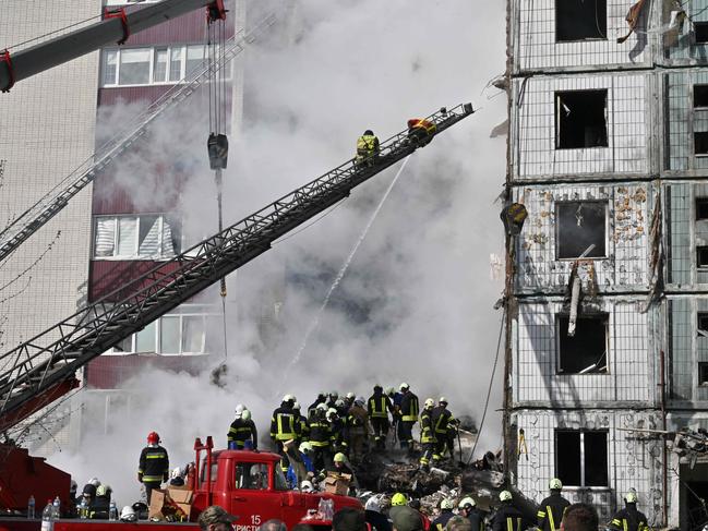 Rescuers search for survivors in the rubble. Picture: AFP