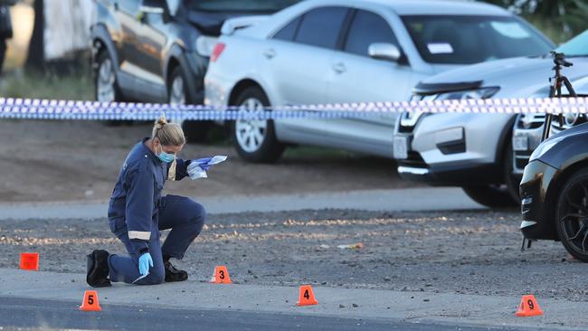 Police at the scene of a fatal drive-by shooting at Ravenhall. Picture: David Crosling