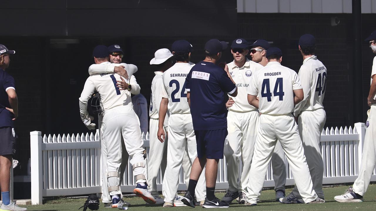 Josh McDonald is embraced by a teammate after this final game for Geelong on Saturday against St Kilda. Picture: Carey Neate.