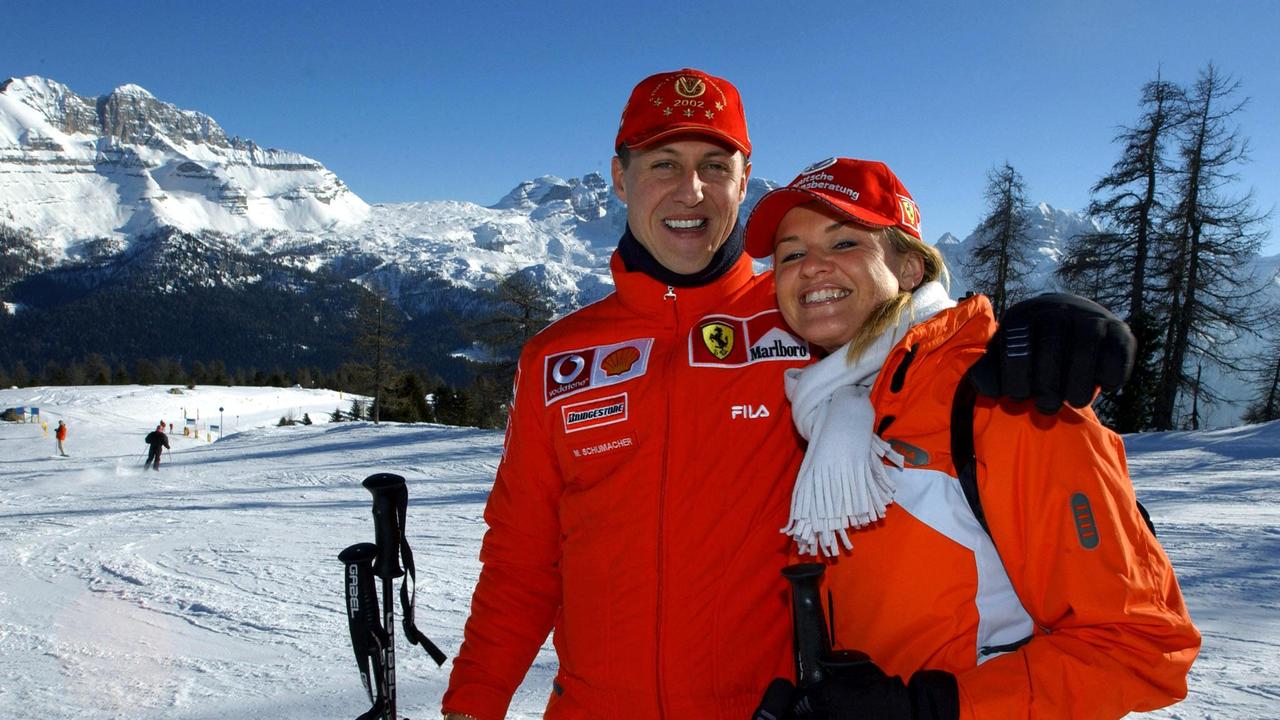 Schumacher with wife Corinna back in 2003. (Photo by Ercole COLOMBO / POOL / AFP)