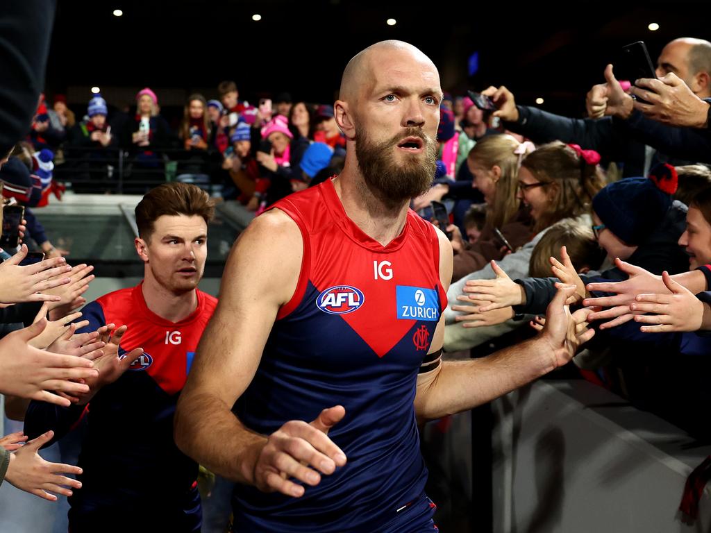 MELBOURNE, AUSTRALIA – JUNE 22: Max Gawn of the Demons leads his team out onto the field during the round 15 AFL match between Melbourne Demons and North Melbourne Kangaroos at Melbourne Cricket Ground, on June 22, 2024, in Melbourne, Australia. (Photo by Quinn Rooney/Getty Images)