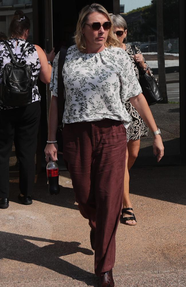 Former Senior Sergeant Sandi-lee Mellon leaving Darwin Local Court after pleading guilty to assaulting her best friend and husband's mistress in August 2022. Picture: Zizi Averill