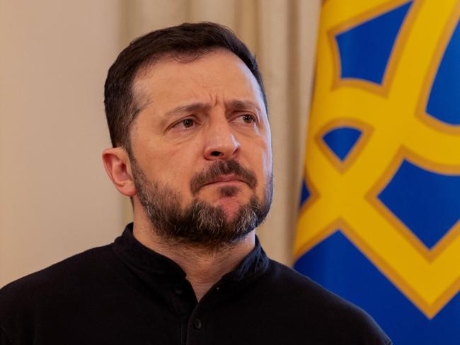 Volodymyr Zelensky is singing his country’s praises today, exclaiming that the devastating attack deep inside Russia overnight will ‘undoubtedly be in history books’. (Photo by Tetiana DZHAFAROVA / POOL / AFP)