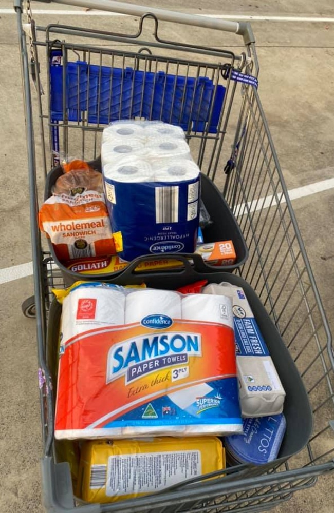 Rather than trying to put groceries into fiddly bags at the checkout, all she has to do is stack them into the tubs. Picture: Facebook/Aldi Mums