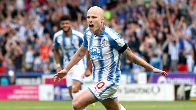 Aaron Mooy celebrates scoring his first Premier League goal against Newcastle.