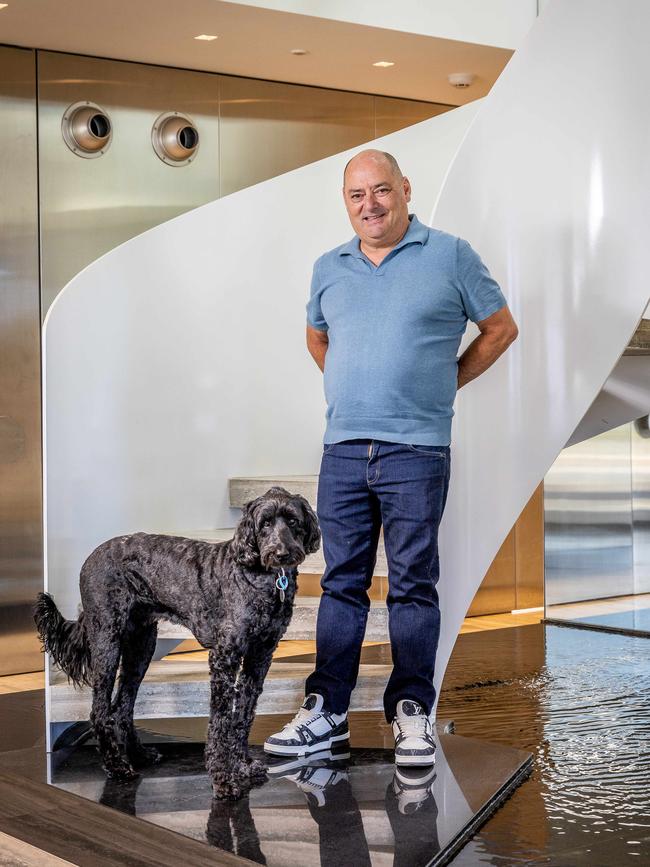 Danny and his dog Herby in his St. Kilda home. Picture: Jake Nowakowski