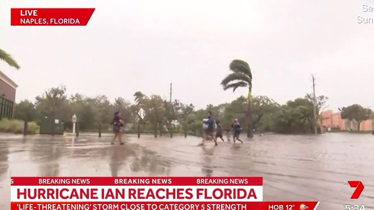 Hurricane Ian: Sunrise cameraman drops gear during cross to help ...