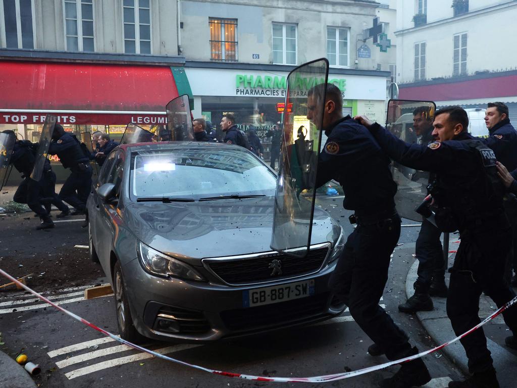 The riot left police and protesters injured. Picture: AFP