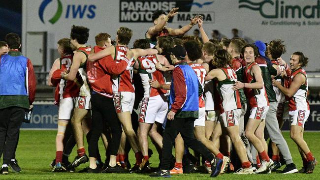 Henley High School players celebrate their win against Prince Alfred College in the State knockout football final at Norwood Oval. Picture: Bianca De Marchi