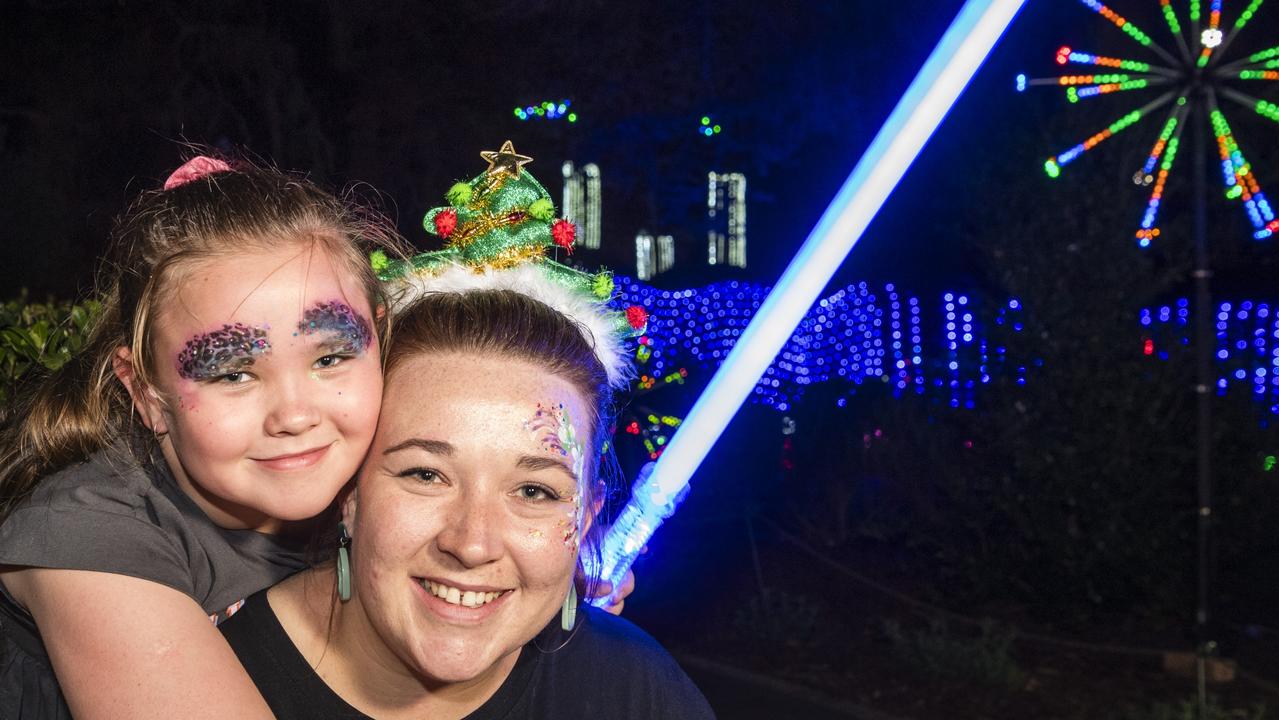 Rume Stander with mum Rozanne Stander at Toowoomba's Christmas Wonderland annual Christmas lights display in Queens Park, Saturday, December 2, 2023. Picture: Kevin Farmer