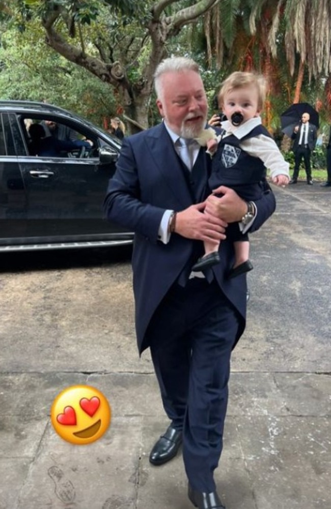 Kyle at the wedding with his son Otto. Picture: Instagram