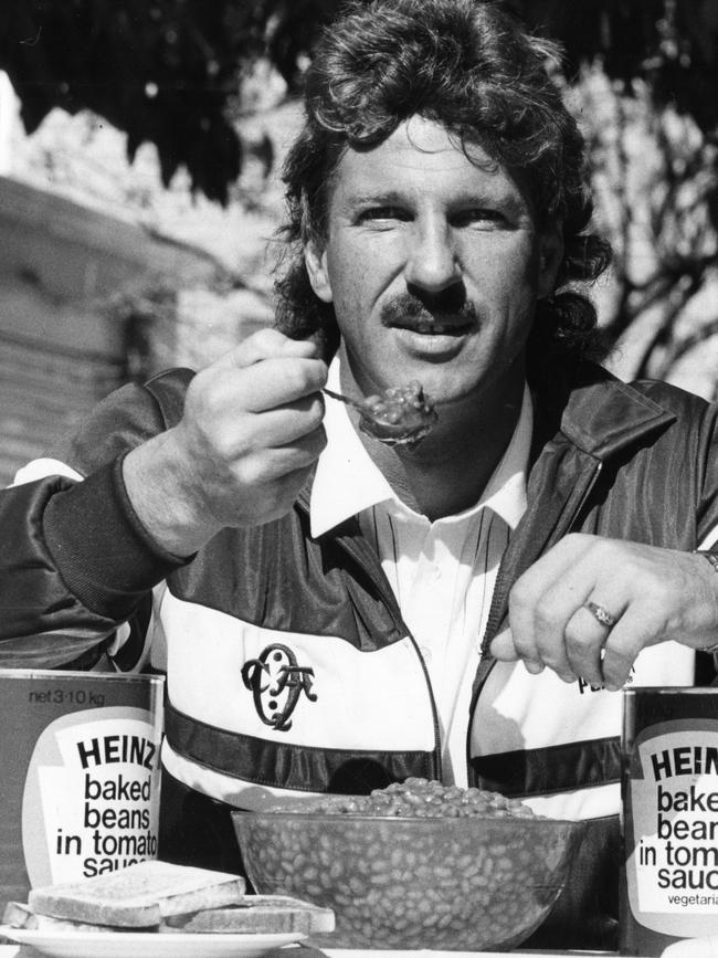 Botham eating baked beans during his Queensland stint.