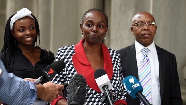 Lucy Gichuhi with her family at her first media conference after the High Court cleared her Senate election.