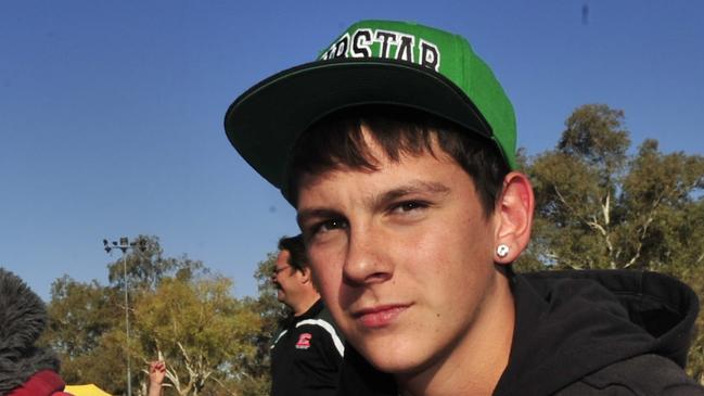 In 2012, Dylan Voller was photographed on the grass at a rugby grand final in Alice Springs. Picture: Charlie Lowson