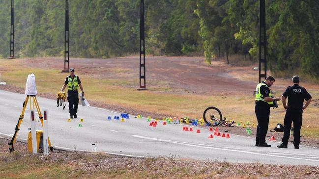 Police at the scene of the fatal crash on Gunn Point Rd in Howard Springs