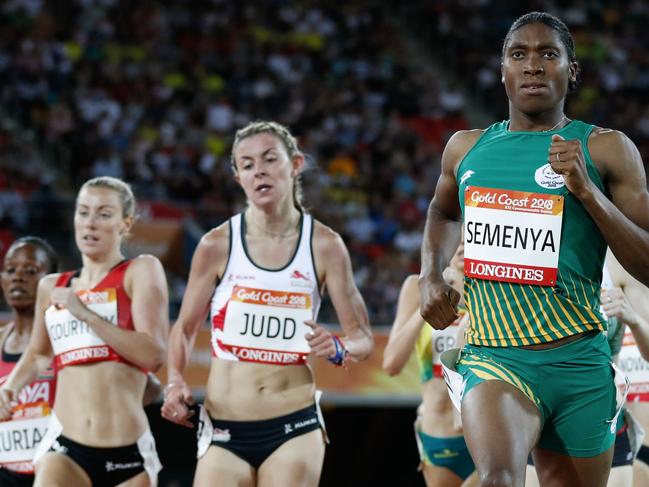 South Africa’s Caster Semenya (R) and England’s Jessica Judd (C) compete in the athletics women's 1500m heats during the 2018 Gold Coast Commonwealth Games at the Carrara Stadium on the Gold Coast on April 9, 2018. / AFP PHOTO / Adrian DENNIS