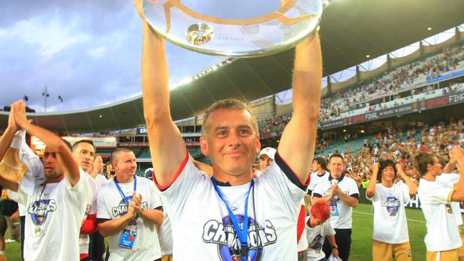 Newcastle Jets coach Gary van Egmond celebrates the grand final win in 2008.