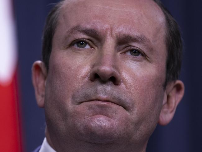 PERTH, AUSTRALIA - JUNE 29: West Australian Premier Mark McGowan speaks to media at Dumas House on June 29, 2021 in Perth, Australia. Lockdown restrictions have come into effect across the Perth and Peel regions for the next four days, following the confirmation of new community COVID-19 cases linked to the highly contagious Delta variant of the coronavirus. From midnight, residents in the Perth and Peel regions are only permitted to leave their homes for essential reasons, including purchasing essential goods, receiving medical care, or caring for the vulnerable. People may leave home to get vaccinated or to exercise within a 5-kilometre radius of their home. Weddings are restricted to five people, funerals to 10 people while gyms, beauty and hair salons, casinos and nightclubs must close. (Photo by Matt Jelonek/Getty Images)