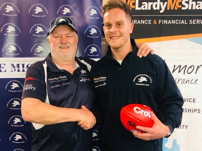 Coburg Districts president Allan Chandler shakes on it with new coach Tom Gleeson. Picture: Facebook