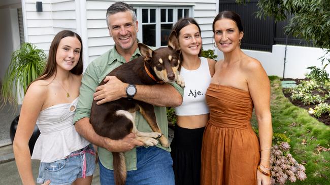 Dennis Scott with wife Mia, daughters Poppy, 13, Matilda, 17, and dog Frankie. Picture by Luke Marsden.