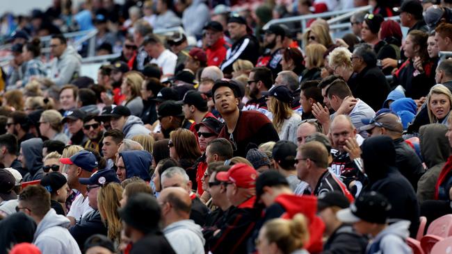 Some of the large crowd at Pepper Stadium, Penrith, watching the A Grade grand final.