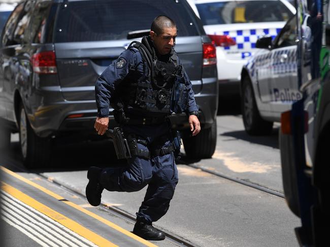 A Special Operations Group officer at the corner of Bourke and Elizabeth streets. Picture: AAP