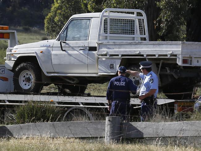 The Stoccos’ white coloured Toyota Land Cruiser vehicle sits on a tow truck after being removed from Pinevale. Picture: AAP Image/David Moir