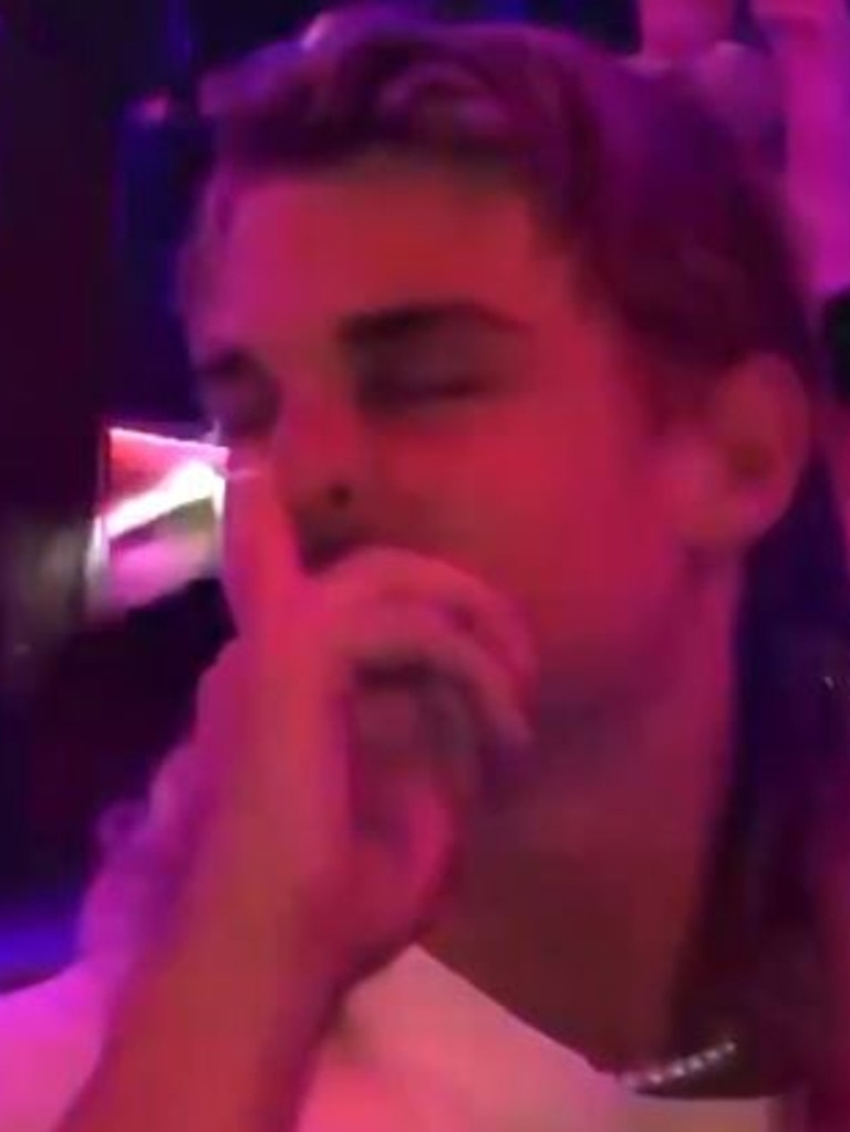 Smith taps his nose in an apparent reference to cocaine use. Source: TikTok