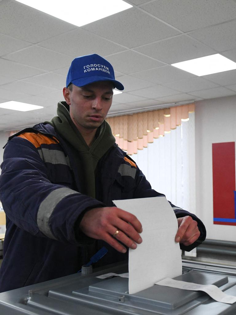 A man votes in Russia's presidential election. Picture: AFP
