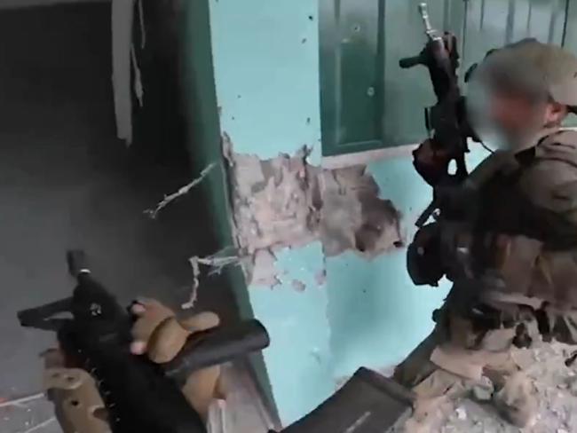 The IDF releases dramatic footage of troops of the elite LOTAR Unit battling Hamas operatives in a school in Gaza City’s Shejaiya neighborhood. Picture: IDF,
