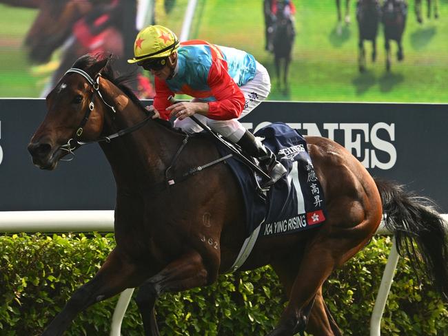 HONG KONG, CHINA - DECEMBER 08: Zac Purton riding Ka Ying Rising winning Race 5, the Longines Hong Kong Sprint during racing at Sha Tin Racecourse on December 08, 2024 in Hong Kong, China.  (Photo by Vince Caligiuri/Getty Images)