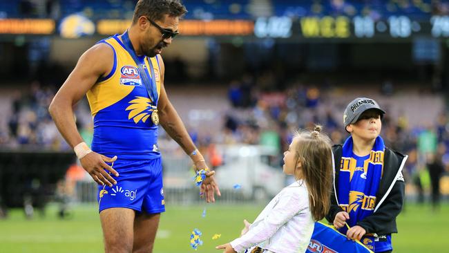 Lewis Jetta celebrates the win with his children. Picture: Mark Stewart