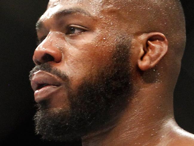 LAS VEGAS, NV - JANUARY 03: Light heavyweight champion Jon Jones waits in a timeout as he defends his title against Daniel Cormier during the UFC 182 event at the MGM Grand Garden Arena on January 3, 2015 in Las Vegas, Nevada. Jones retained his title by unanimous decision. (Photo by Steve Marcus/Getty Images)