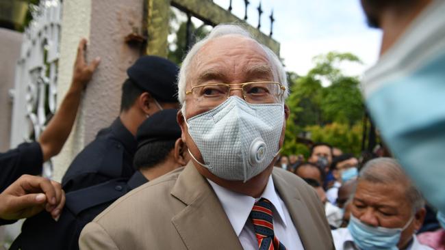 Najib Razak arrives at the Duta Court complex in Kuala Lumpur on Tuesday. Picture: AFP