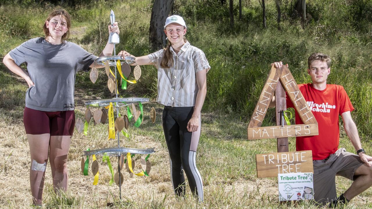 (from left) Rose Richardson, Isabel Barton and Reuben Richardson on the Hike to Heal scavenger hike. Picture: Nev Madsen